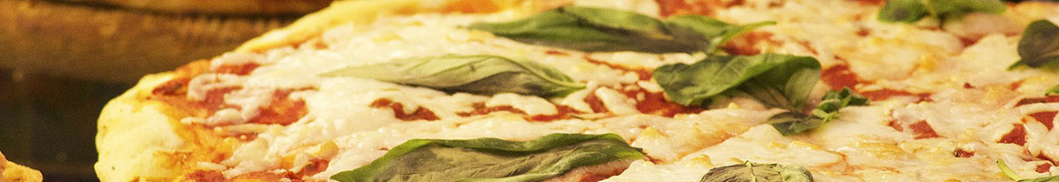Eating Greek Italian Mediterranean Pizza at Delia's Pizzeria & Grille restaurant in Springfield, VA.